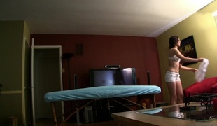 Lovely brunette hair in shorts riding giant shlong hardcore on massage bed