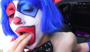 Golden-haired with a mask on her face is getting fucked on the side of the road