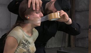 Small chick hangs from the ceiling during the time that the stud attacks her cunny